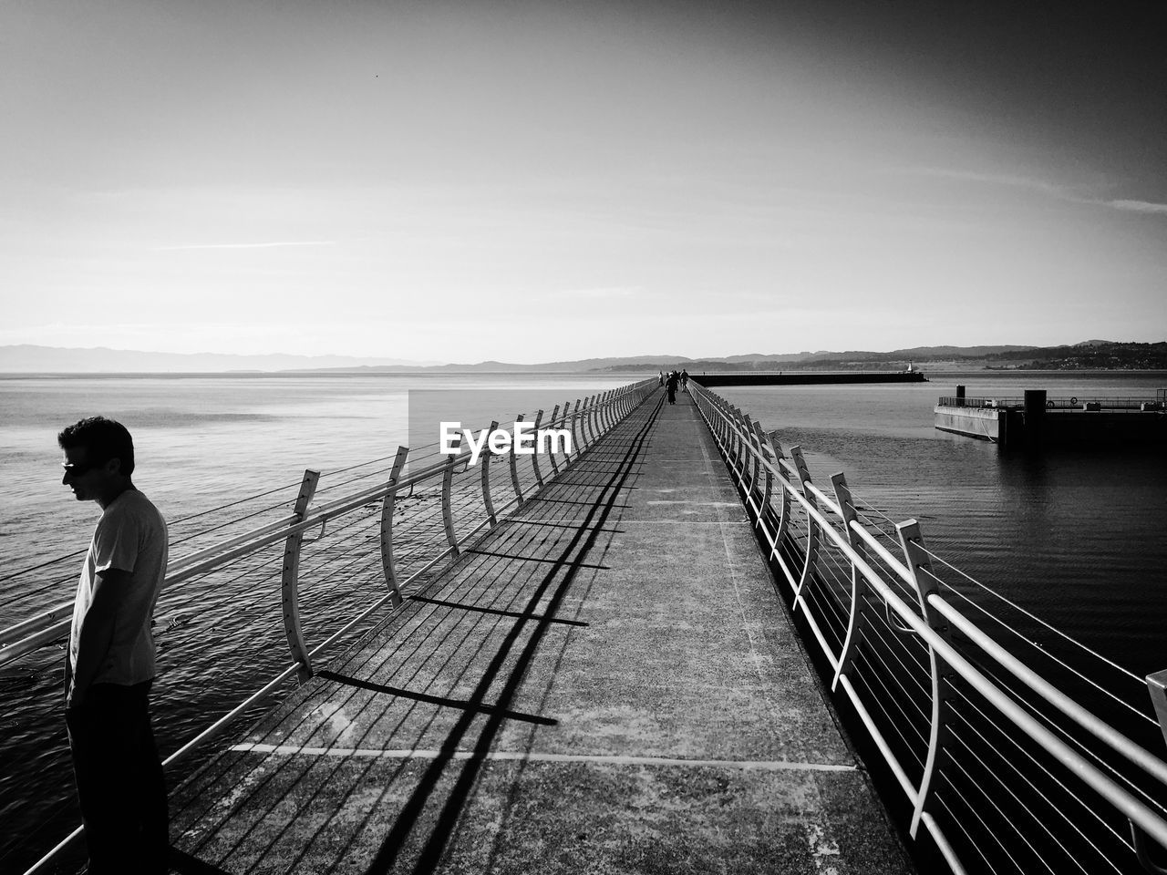 VIEW OF RAILING ON SEA