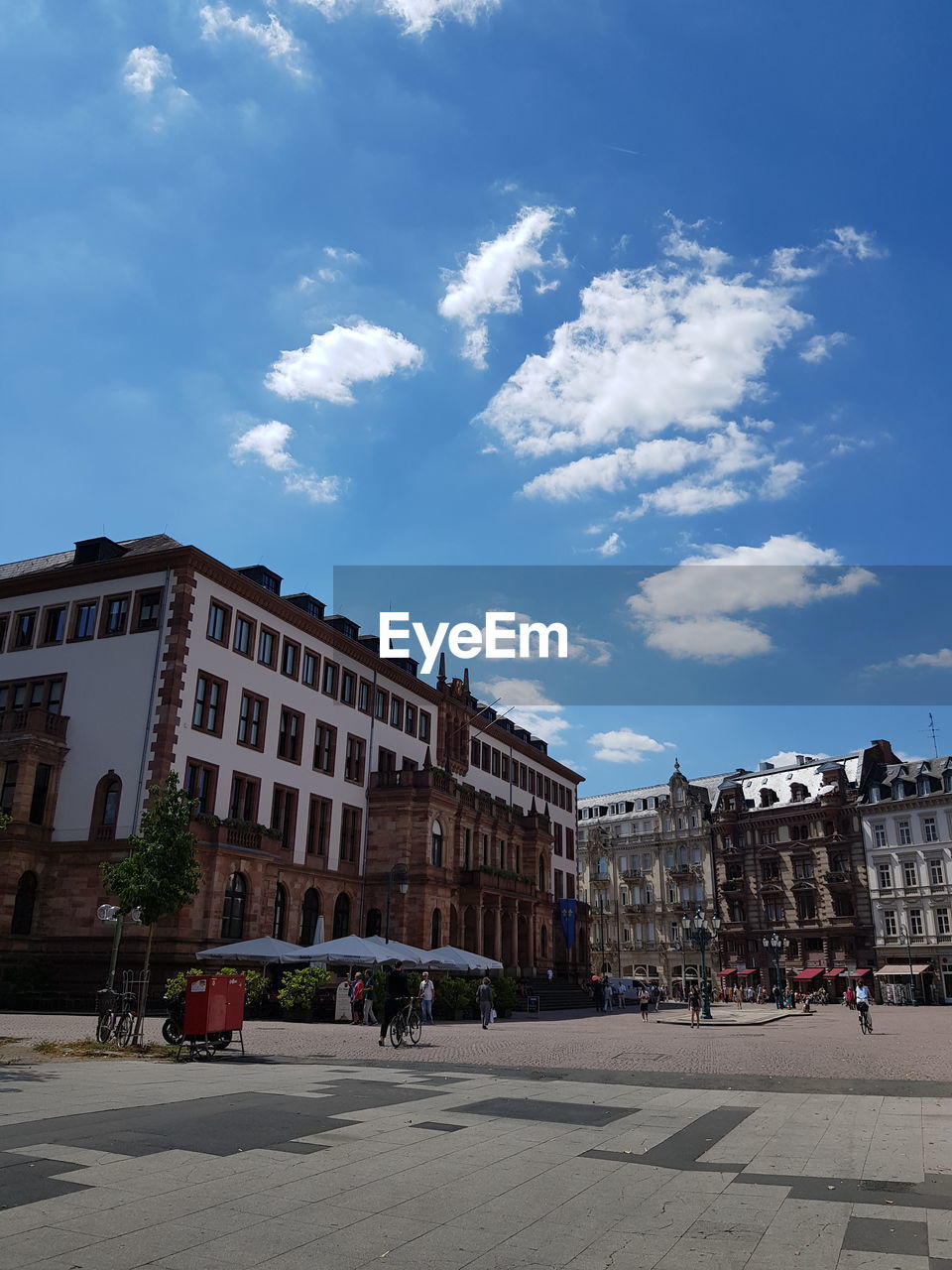 Buildings in city against sky