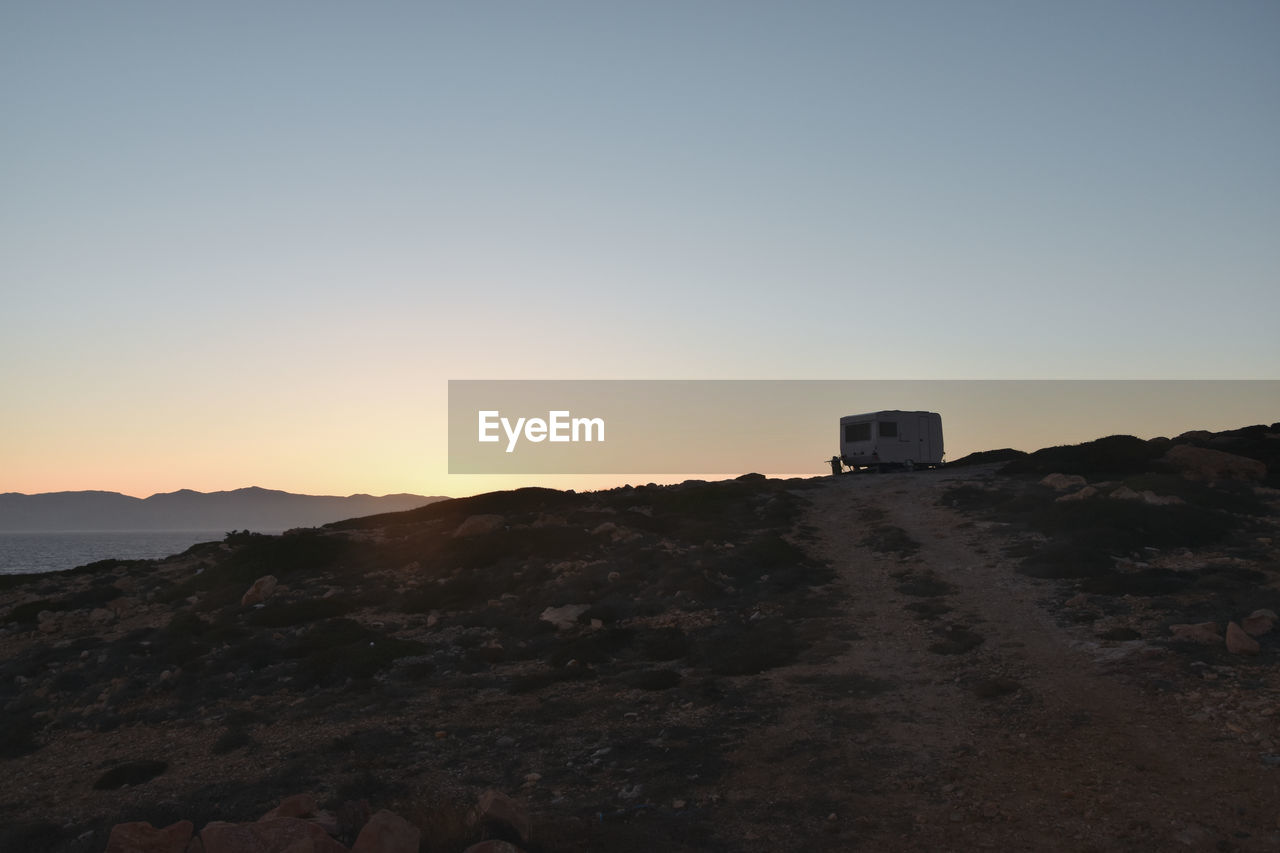 Scenic view of mountains against clear sky