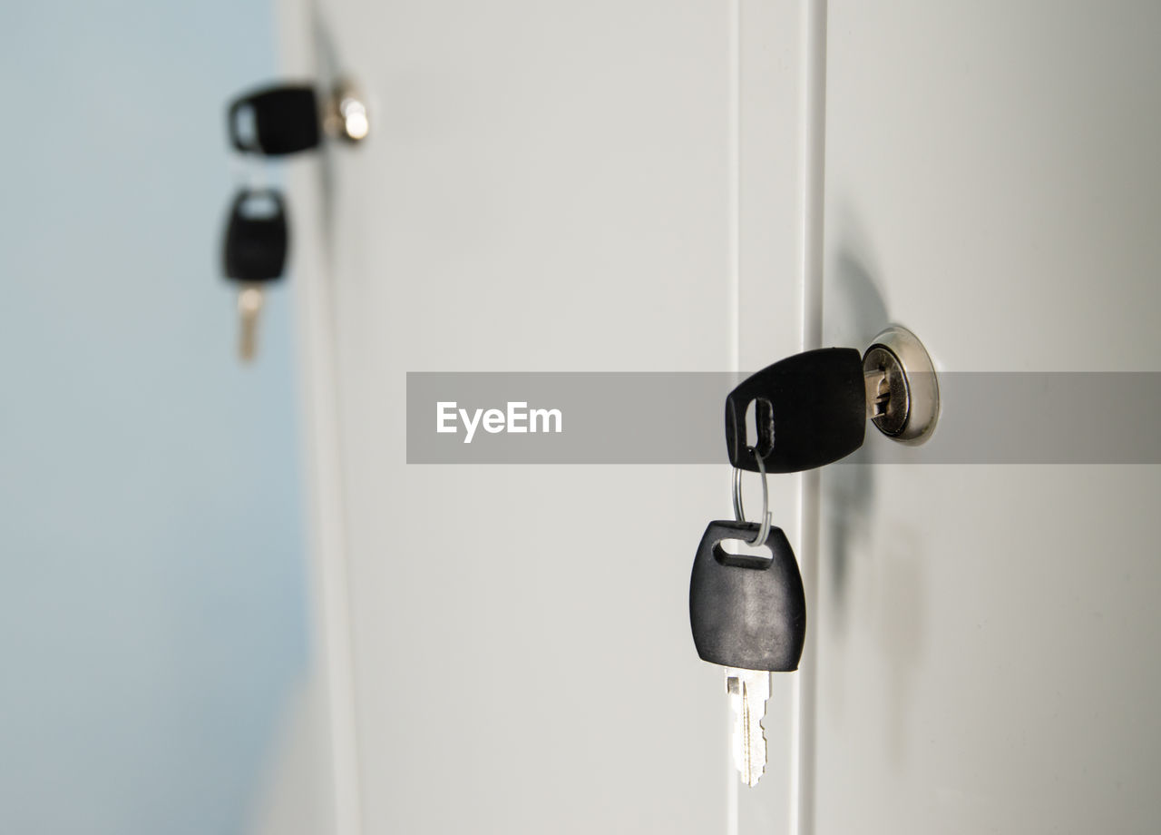 Keys in the door of a private locker