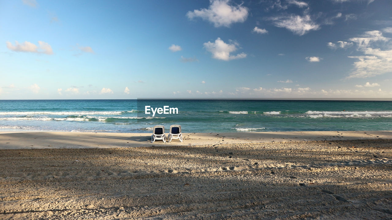 Scenic view of beach against sky