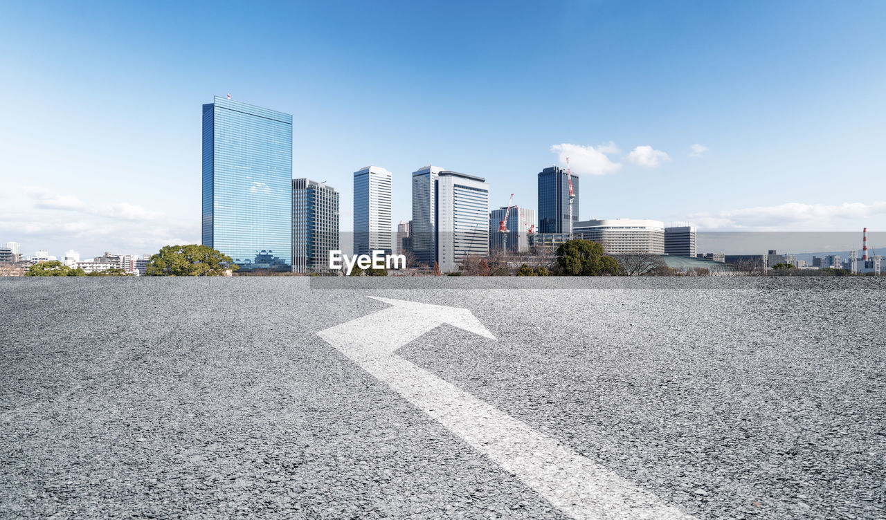 VIEW OF MODERN BUILDINGS AGAINST SKY