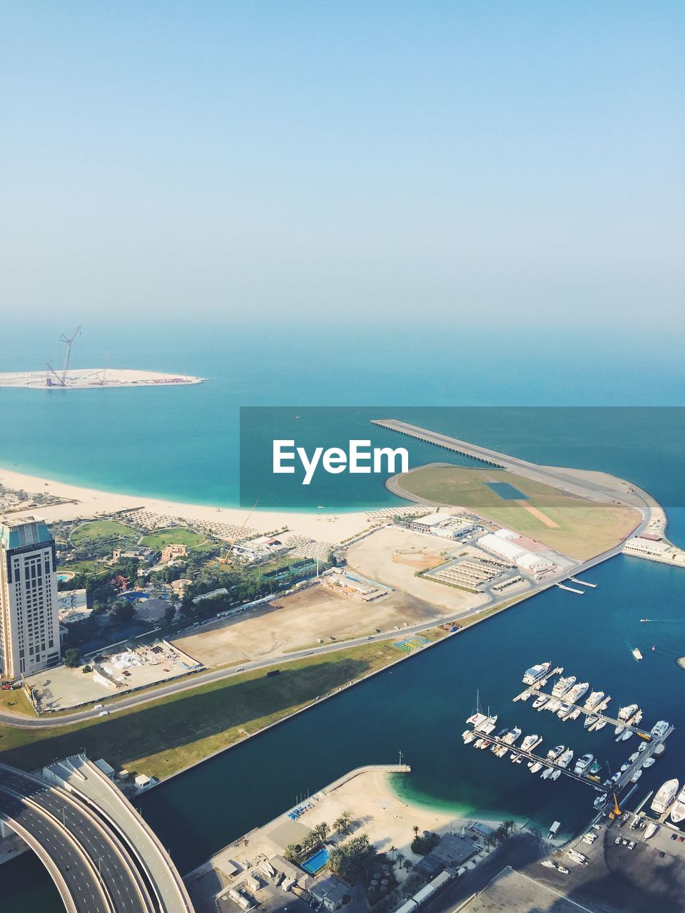 Elevated view of coastline and marina