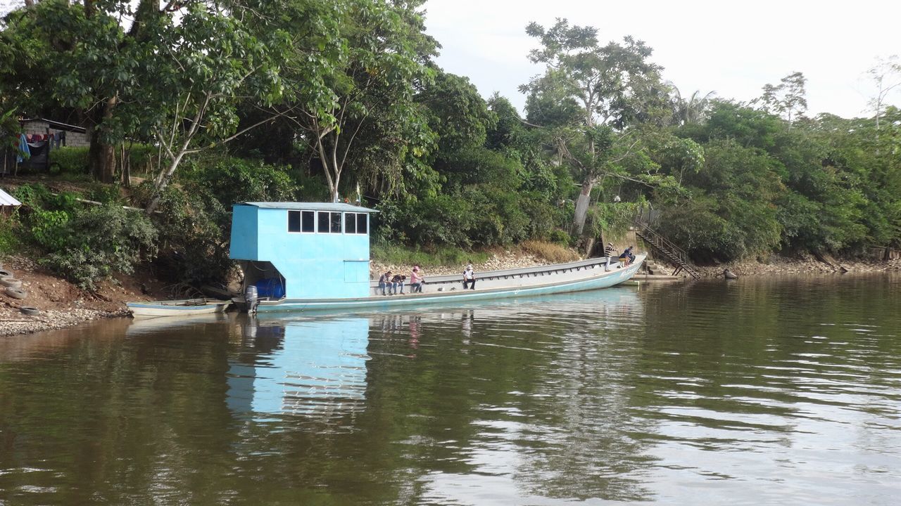 VIEW OF BOATS IN RIVER