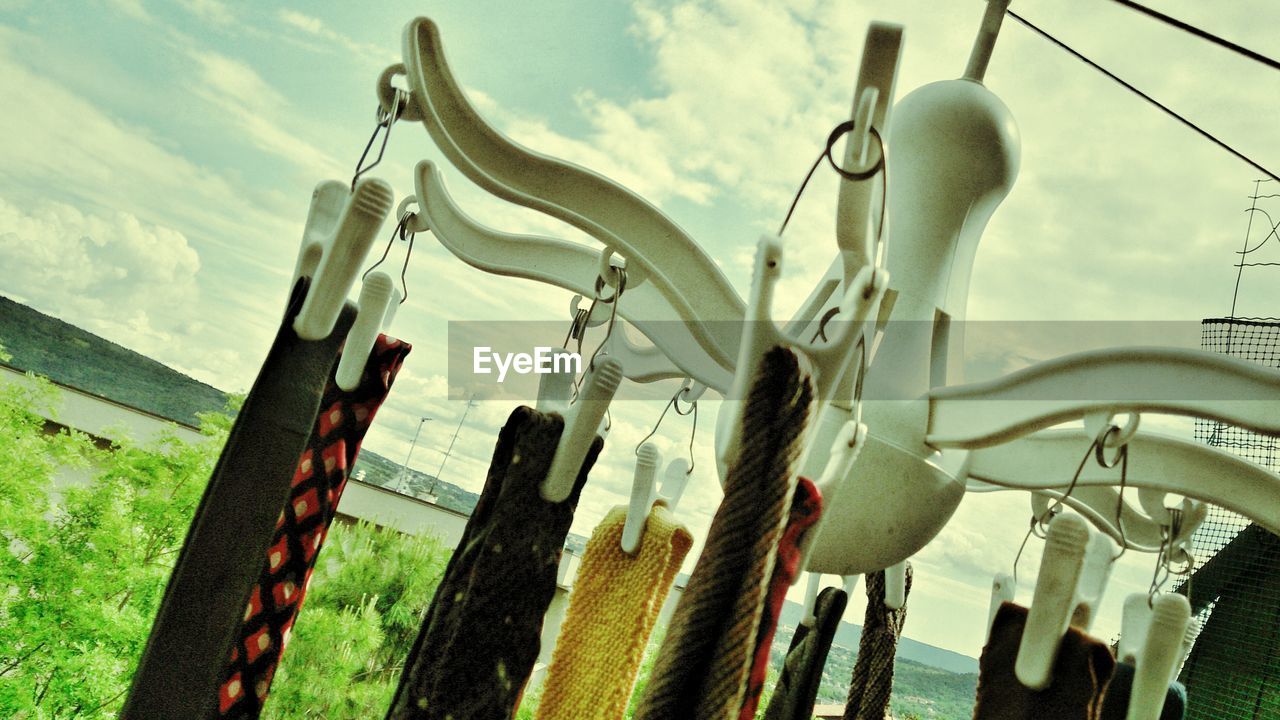 Tilt image of ties hanging on clothesline