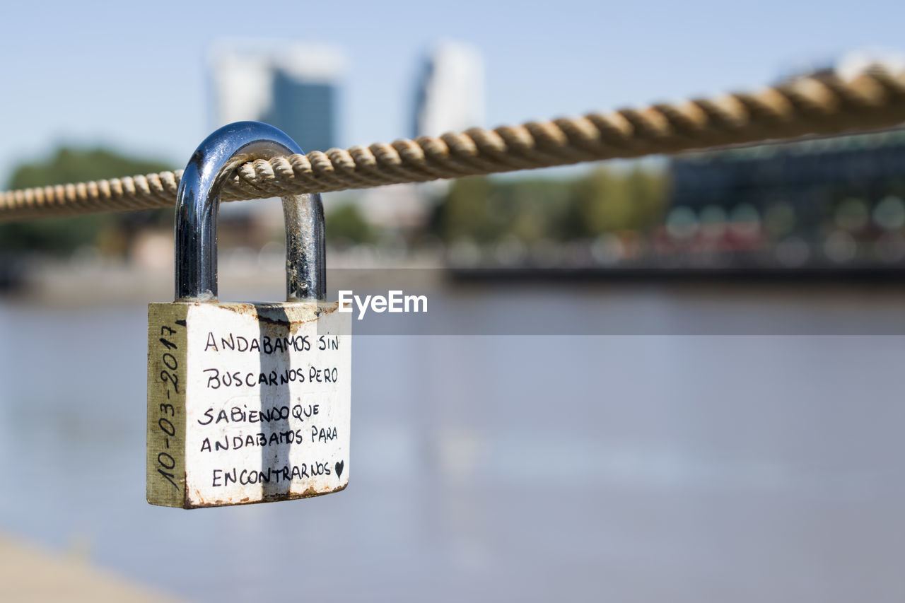 CLOSE-UP OF PADLOCKS