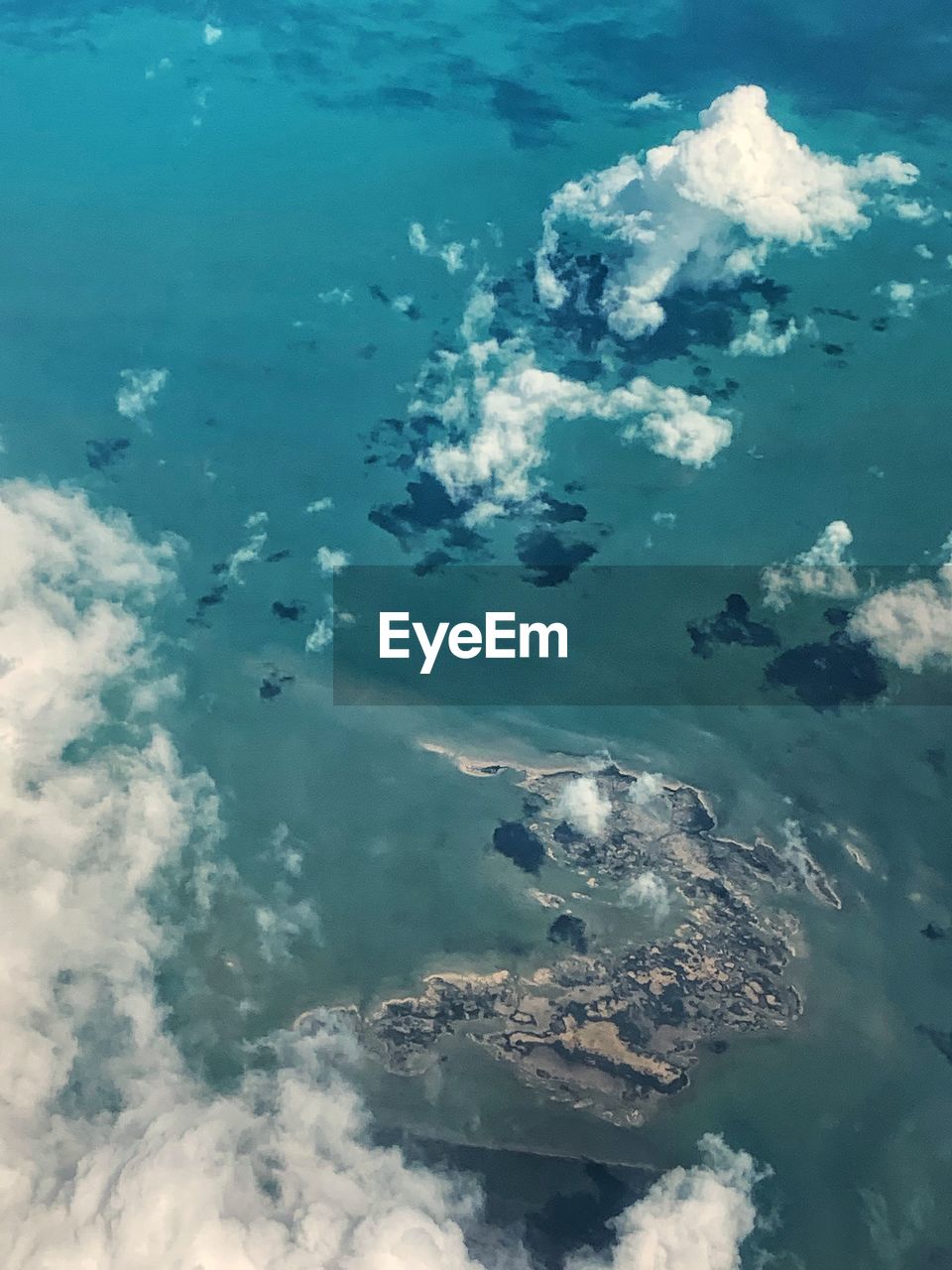 AERIAL VIEW OF SEA AND FISH UNDERWATER