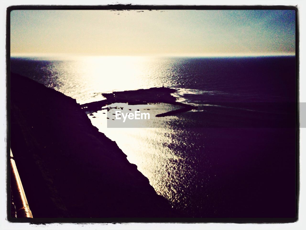 VIEW OF SEA AT SUNSET