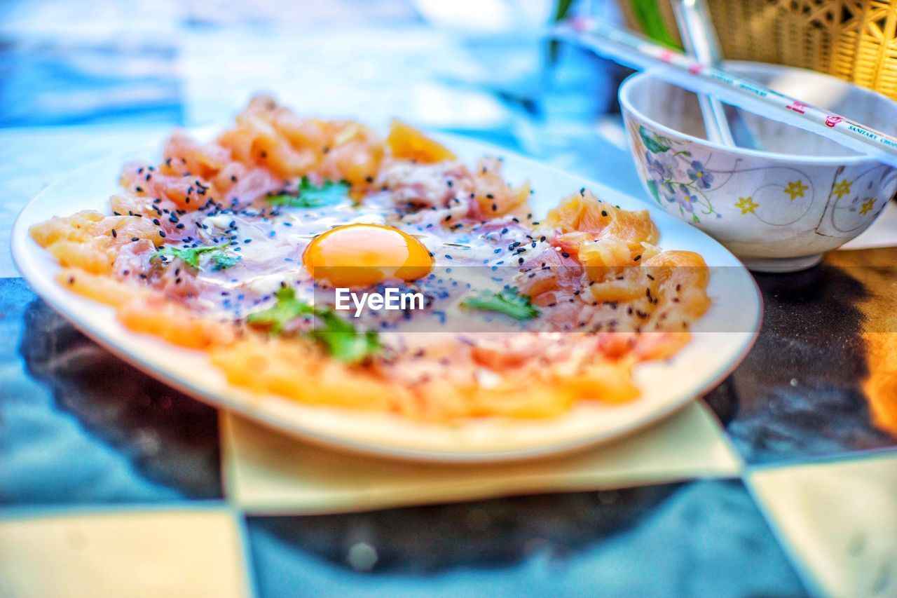 Close-up of breakfast served on table