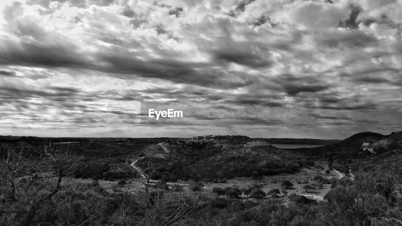 View of landscape against cloudy sky