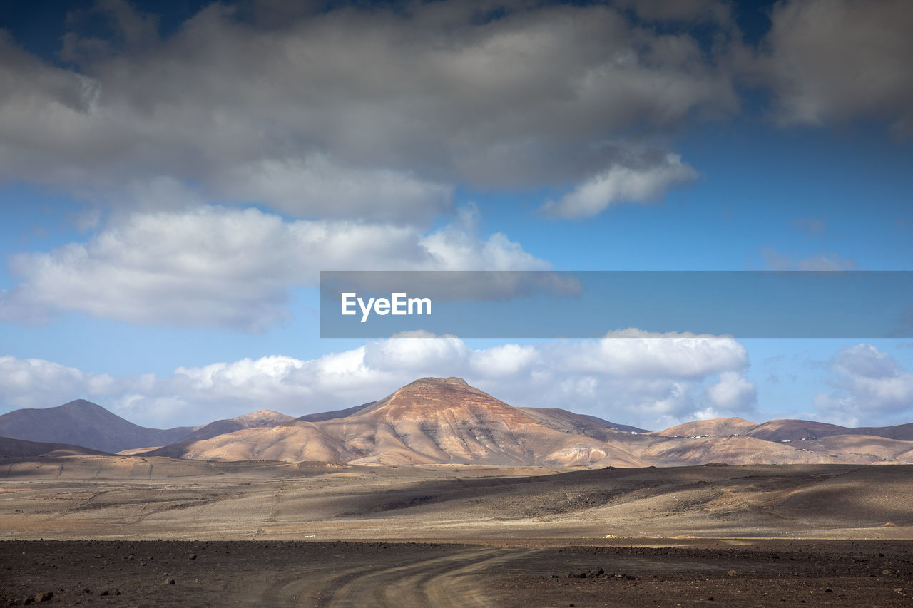 Scenic view of desert against sky