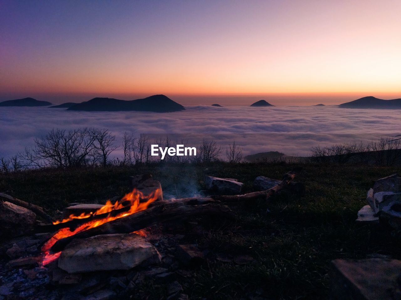 Scenic view of sea against clear sky during sunset