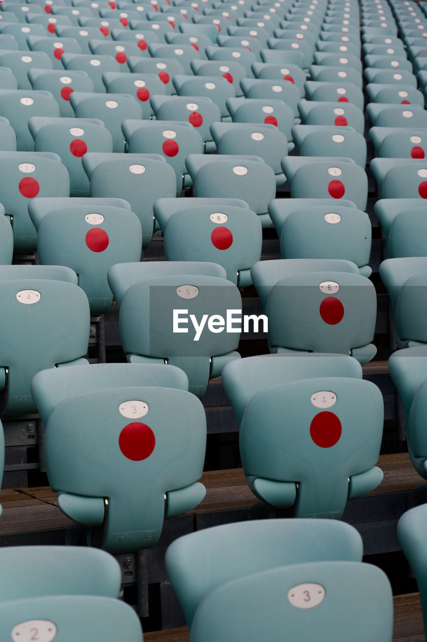 Rows of empty seats in an auditorium