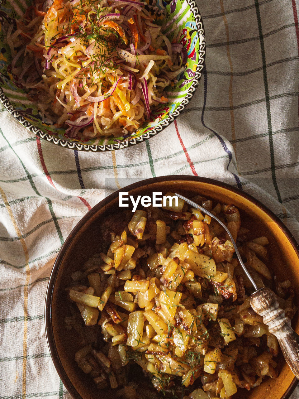 Fried potatoes and vinegar coleslaw