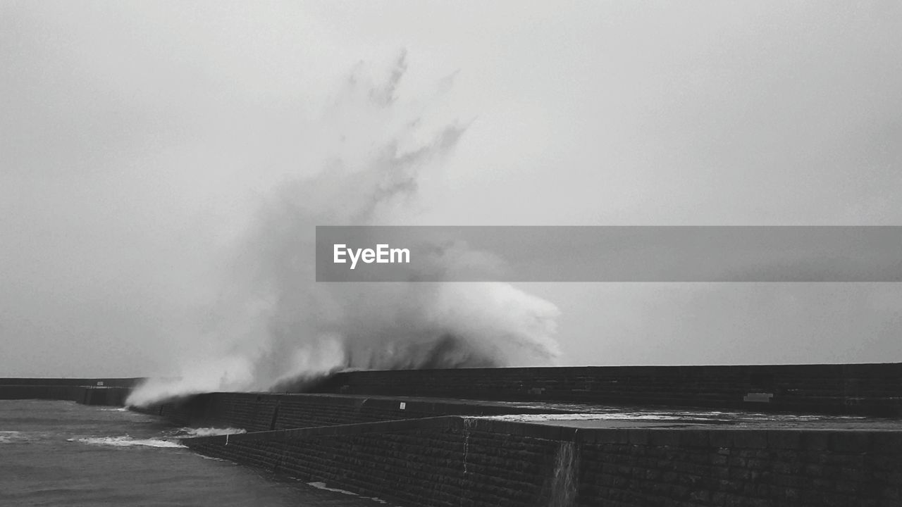 SEA WAVES AGAINST SKY