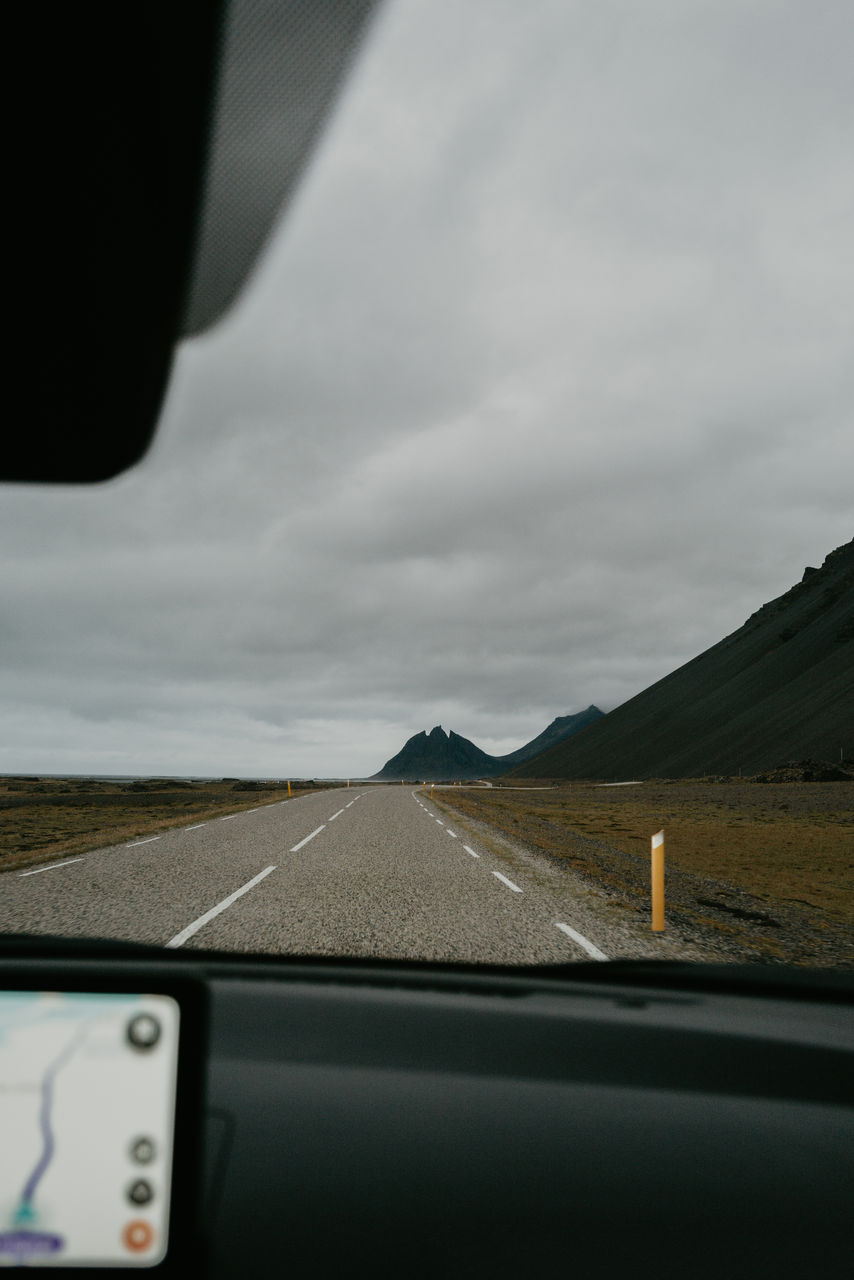 View from the car driving towards eystrahorn using gps in iceland