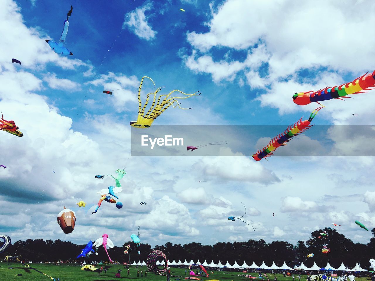 LOW ANGLE VIEW OF DECORATIONS HANGING ON SKY