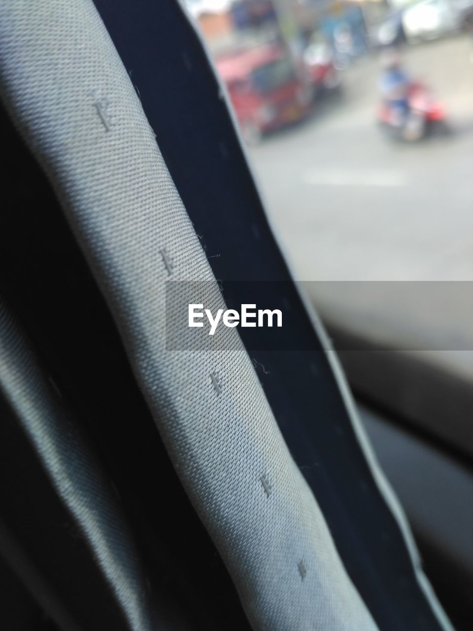 CLOSE-UP OF CAR ON WINDSHIELD