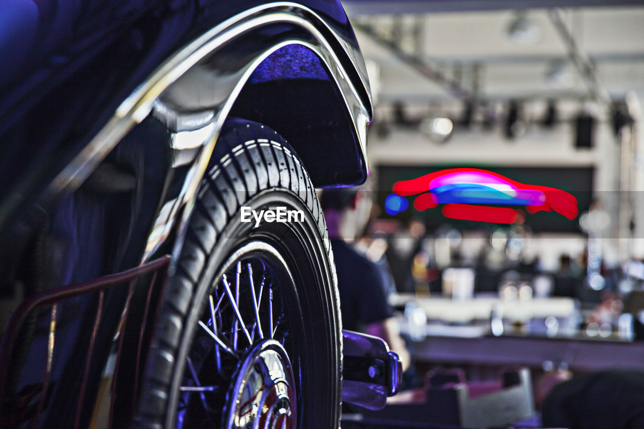 CLOSE-UP OF BICYCLE ON METAL CITY