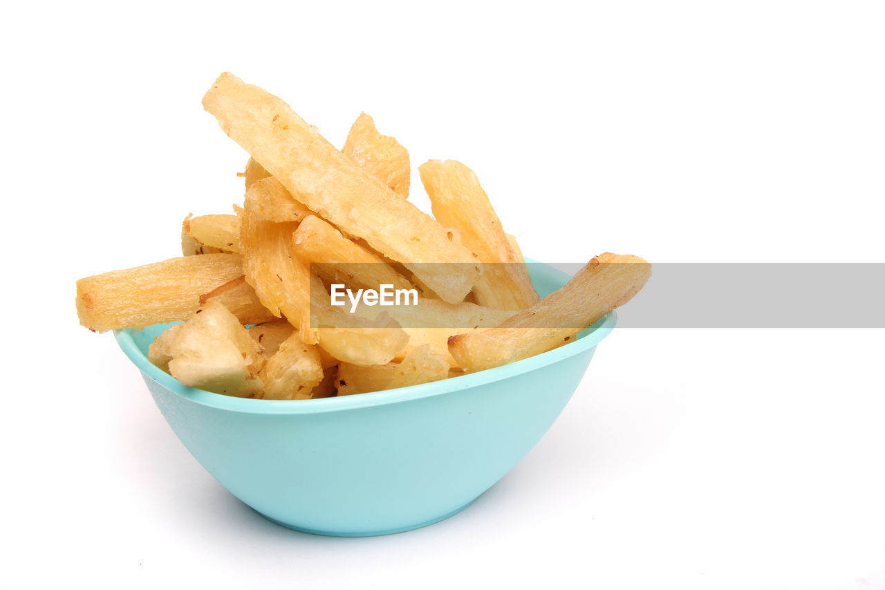 food, food and drink, unhealthy eating, french fries, raw potato, fast food, snack, cut out, junk food, white background, fried, dish, potato chip, produce, bowl, studio shot, fried food, indoors, freshness, no people, deep frying, cuisine, take out food, fast food restaurant