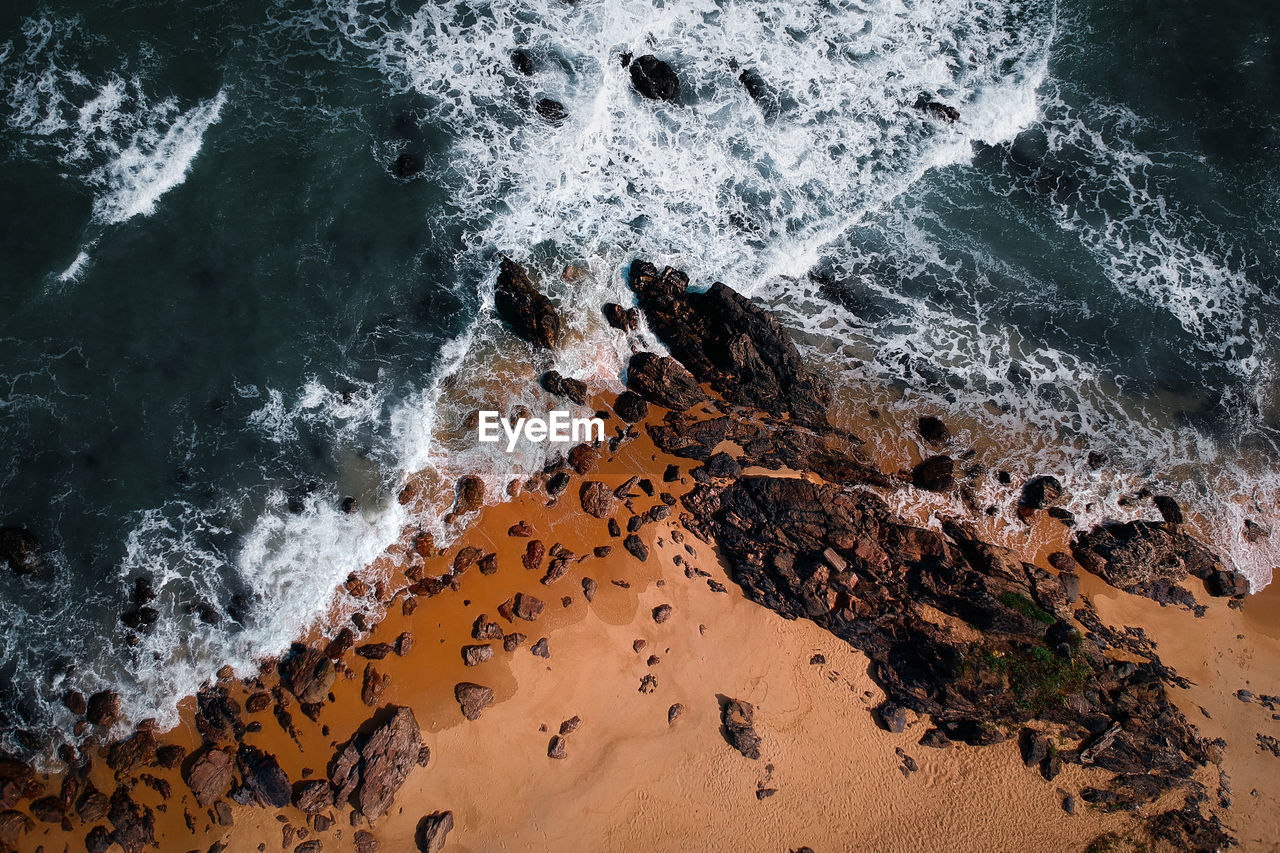 High angle view of rocks on beach