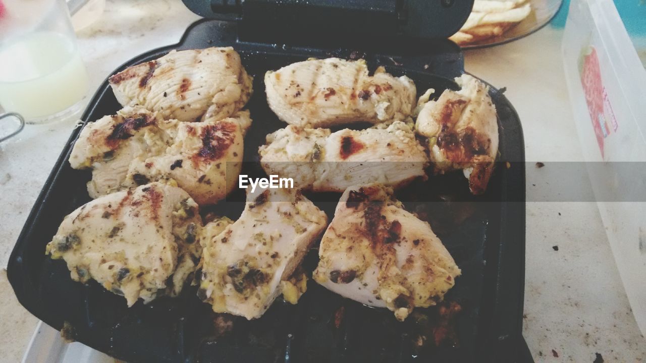 Grilled chicken on mini-barbecue