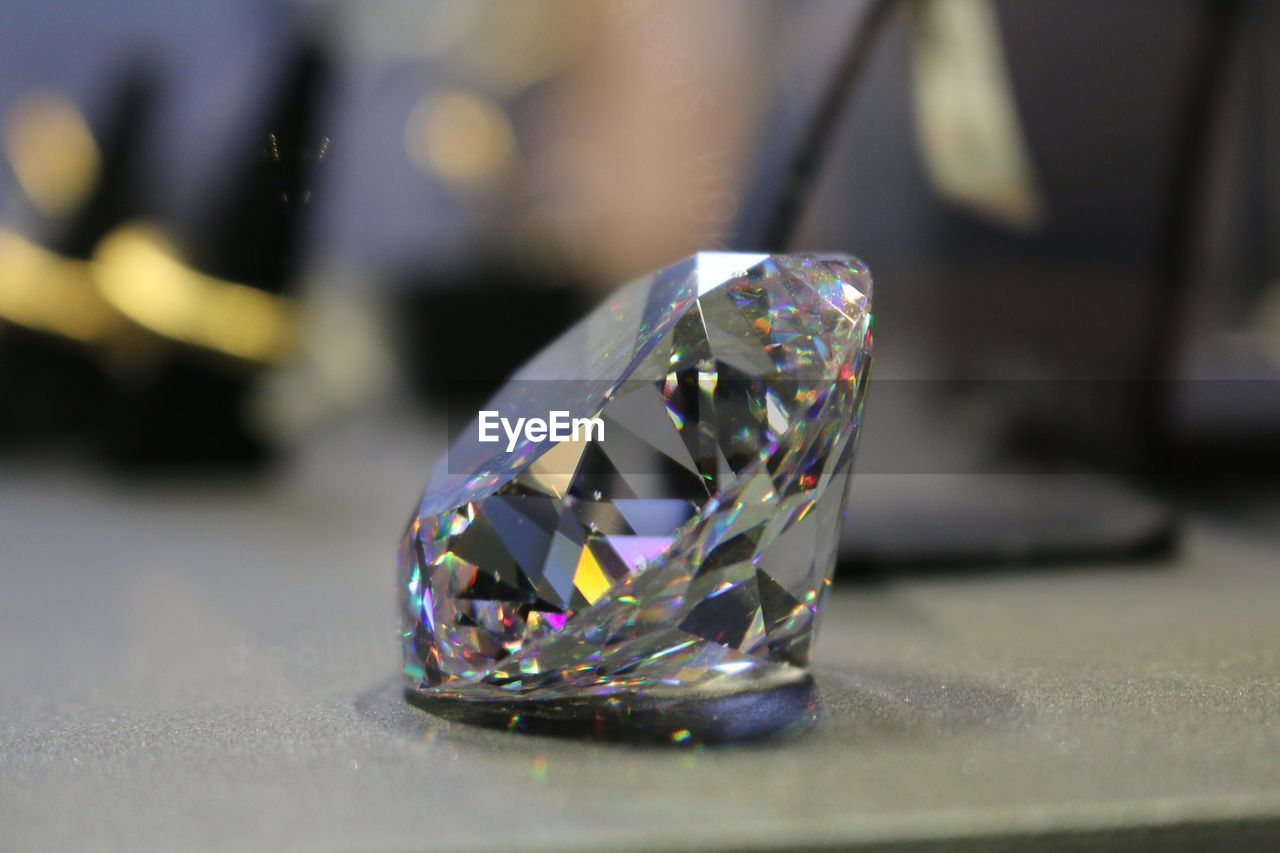 Close-up of diamond on table in jewelry store