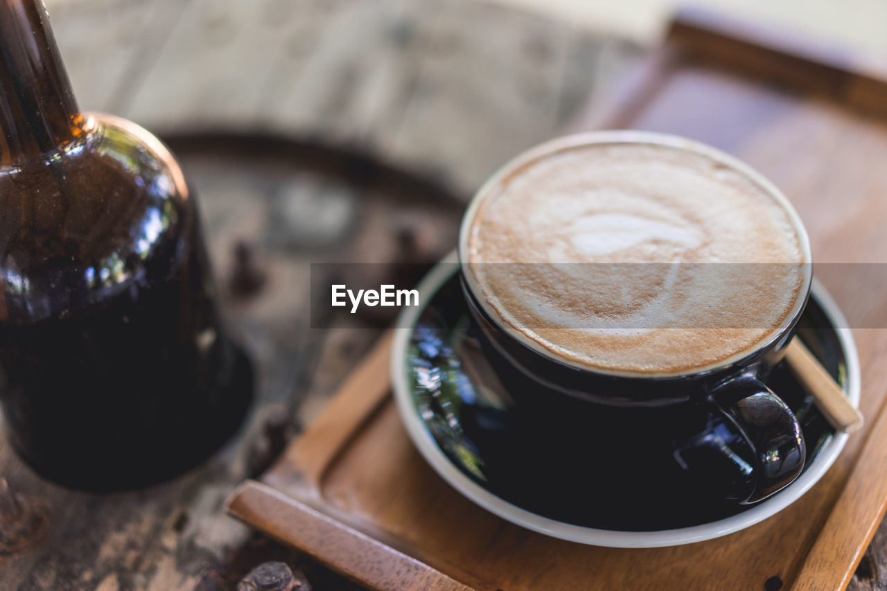 High angle view of coffee cup on table