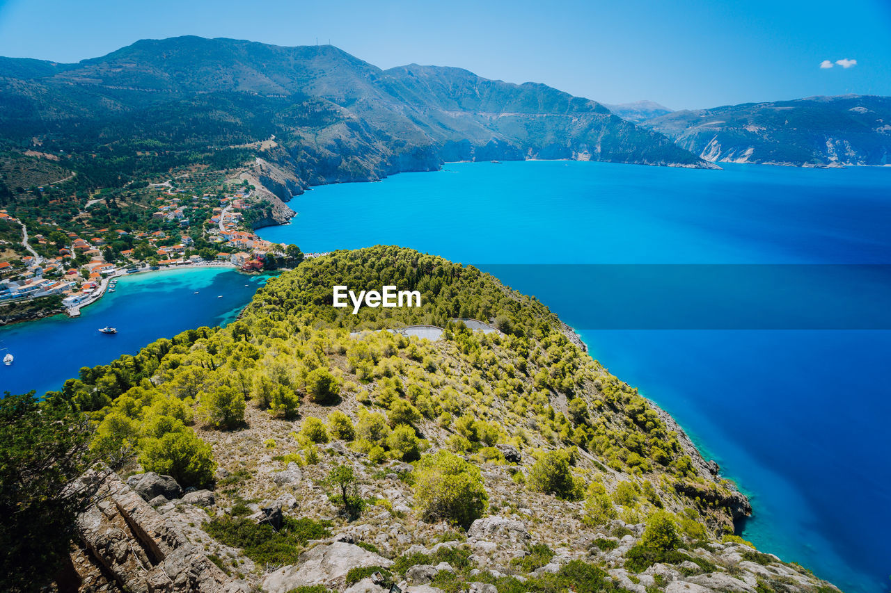 High angle view of bay against mountains