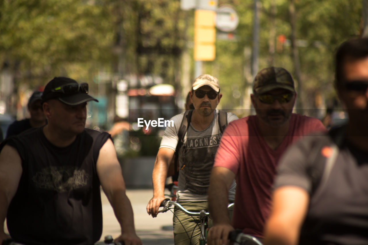 YOUNG MAN WEARING SUNGLASSES