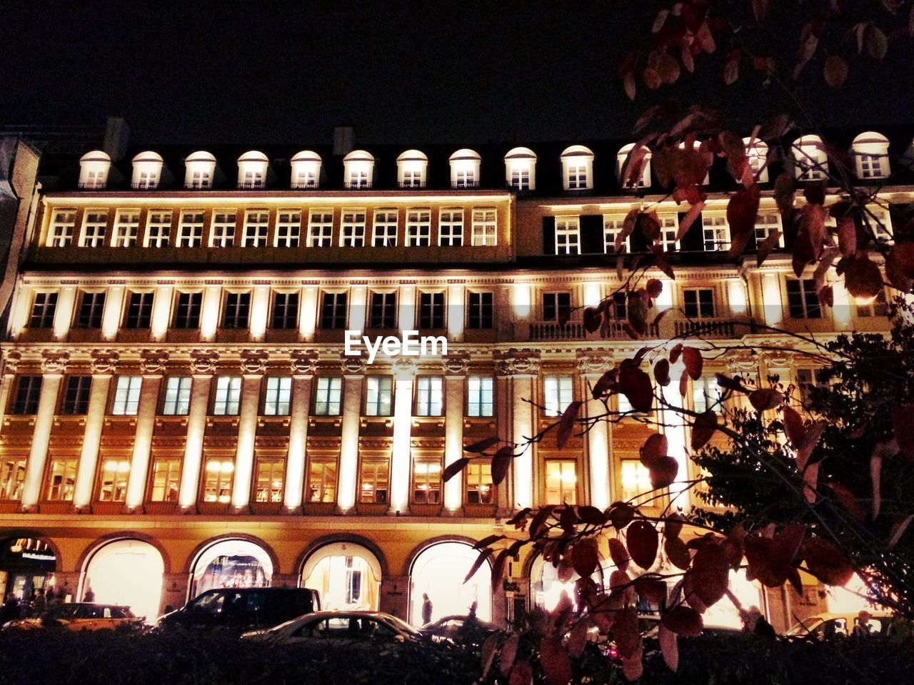 FACADE OF BUILDING AT NIGHT