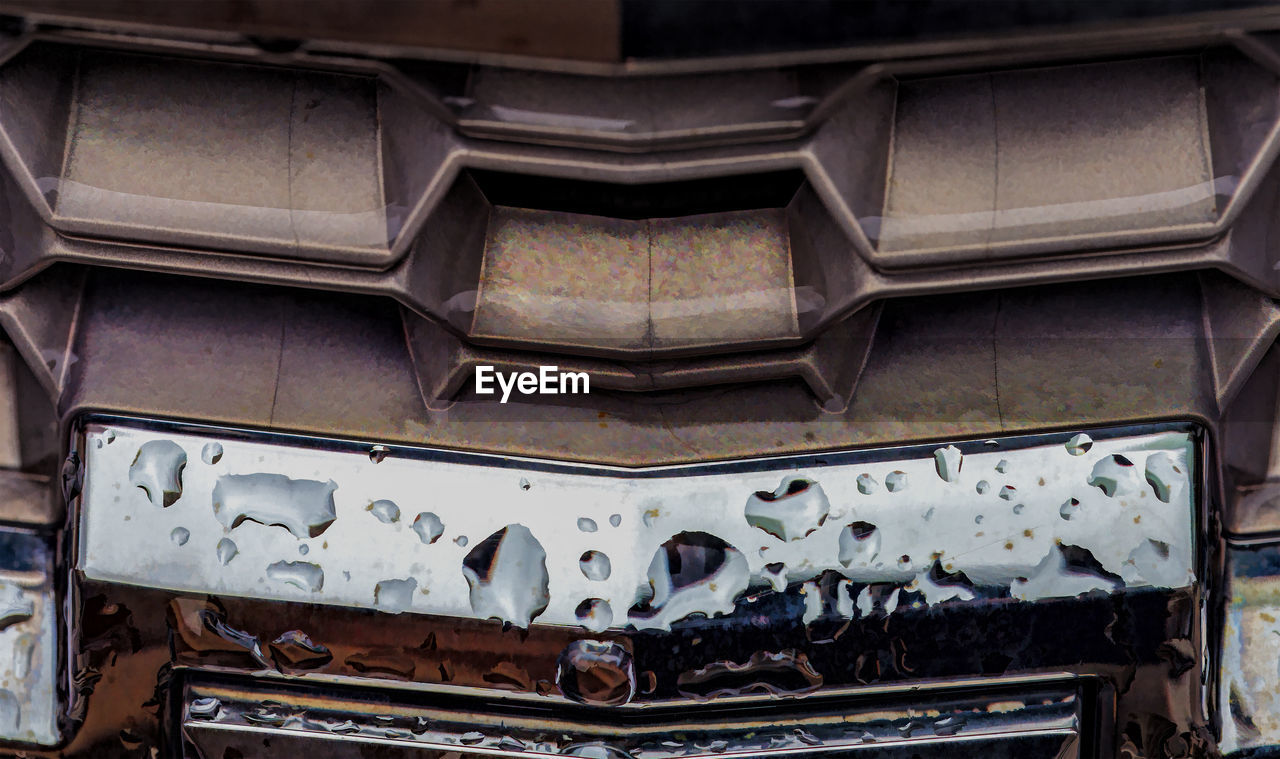 Detail of car with raindrops