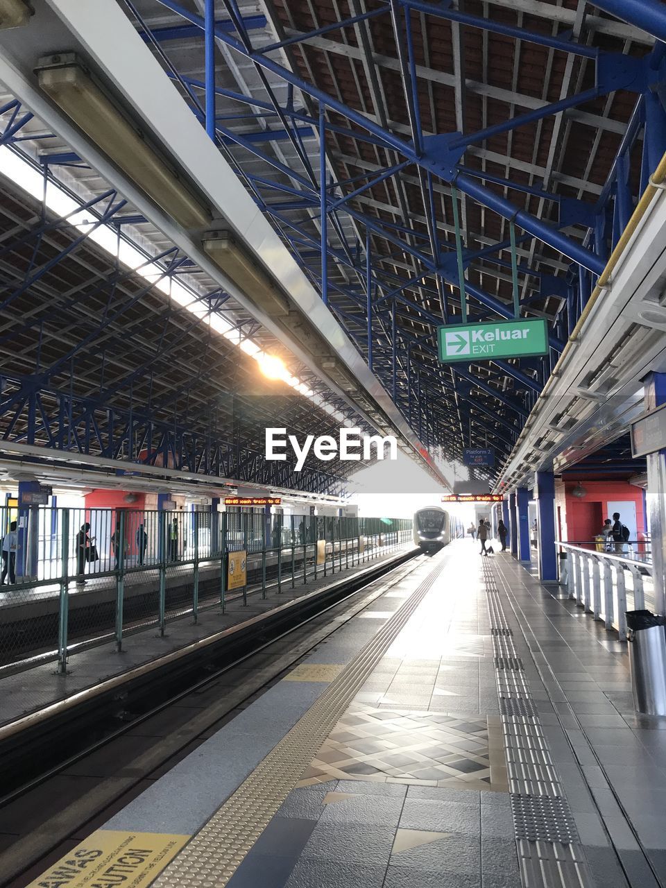 architecture, public transport, transport, transportation, built structure, metro, metropolitan area, mode of transportation, rail transportation, indoors, city, illuminated, escalator, railroad station, technology, train, travel, public transportation, no people, futuristic, the way forward, railroad track, motion, vehicle