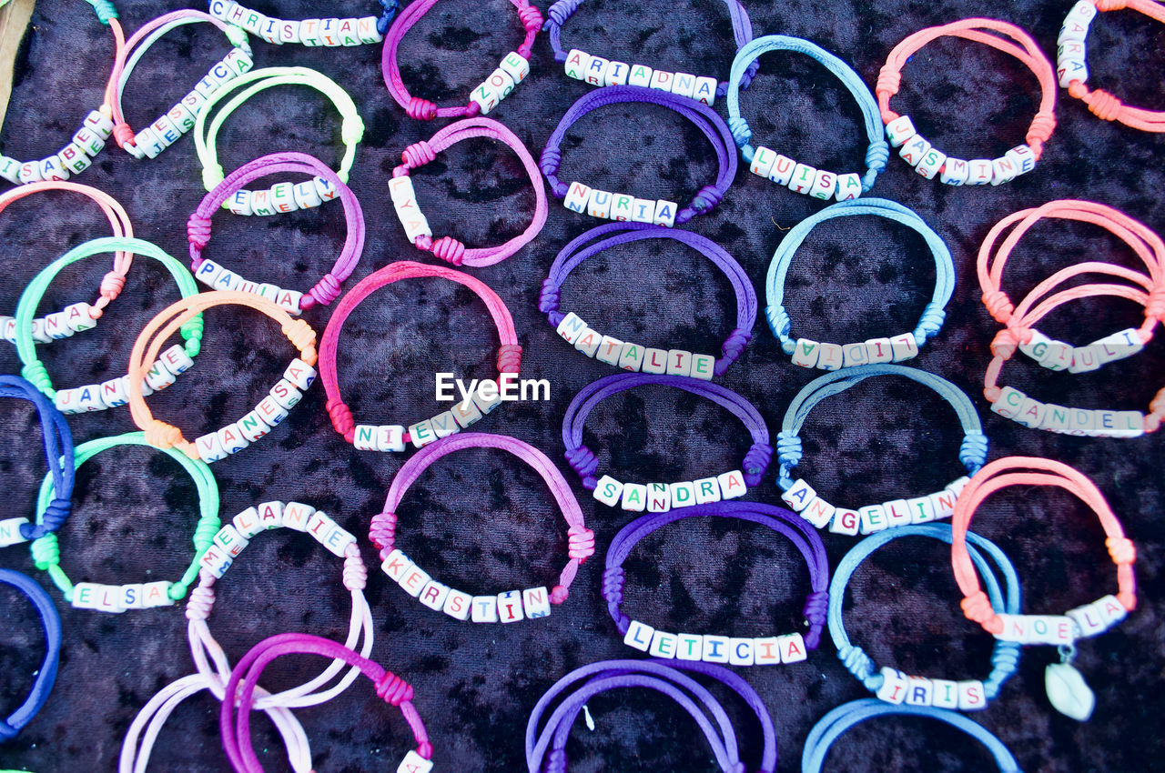 High angle view of rubber bracelets on table