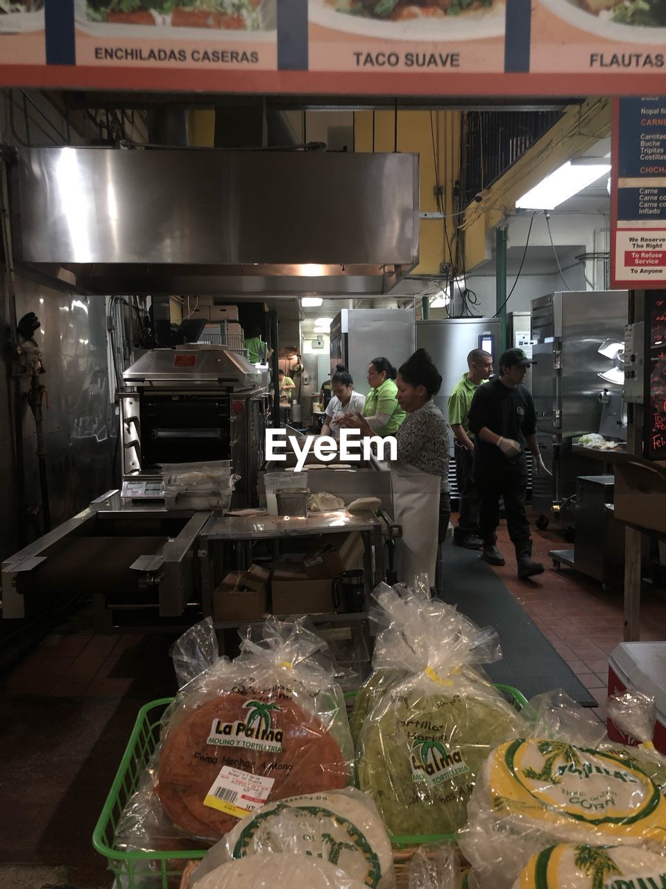 GROUP OF PEOPLE IN RESTAURANT