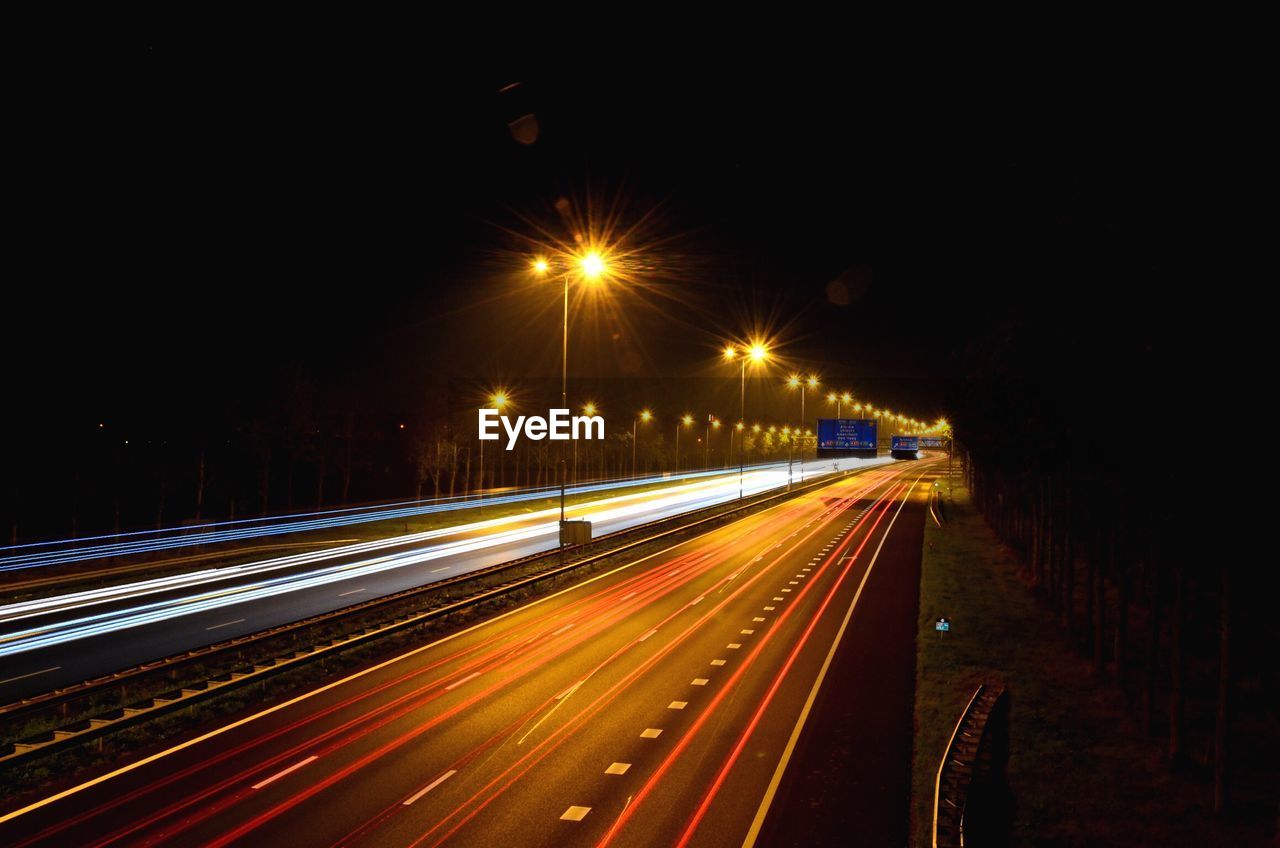 Light trails on road at night