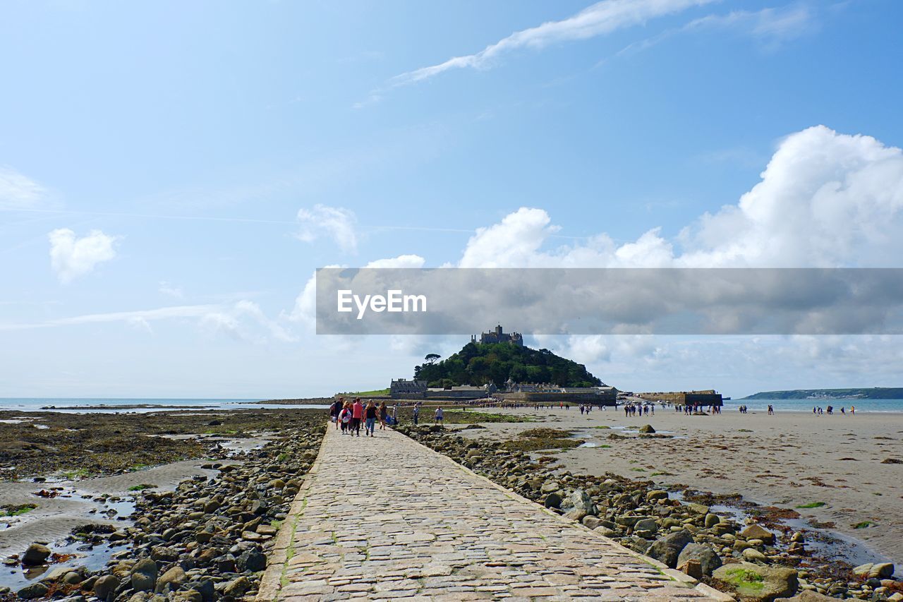 PANORAMIC VIEW OF BEACH AGAINST SKY