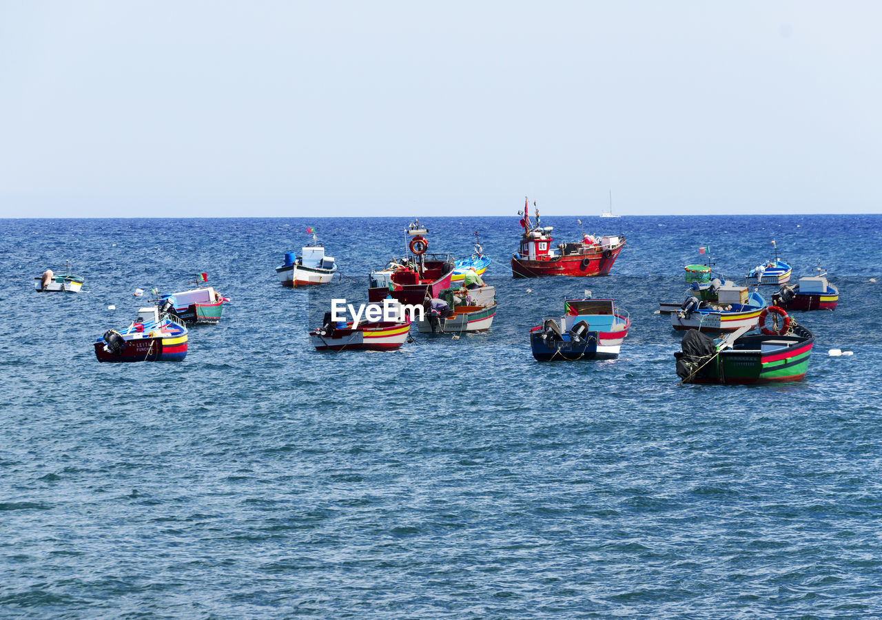 Boats in calm sea