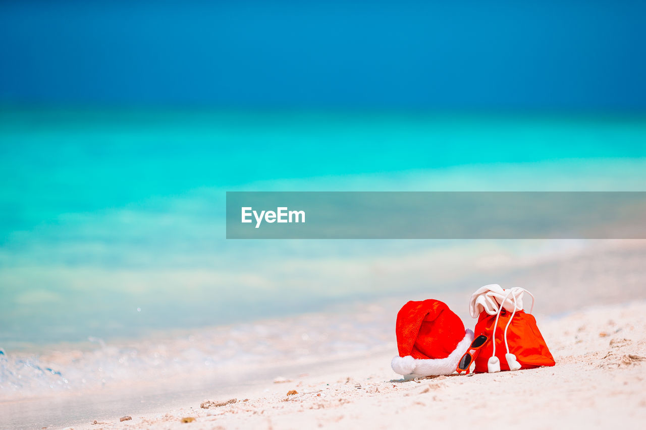 RED UMBRELLA ON BEACH