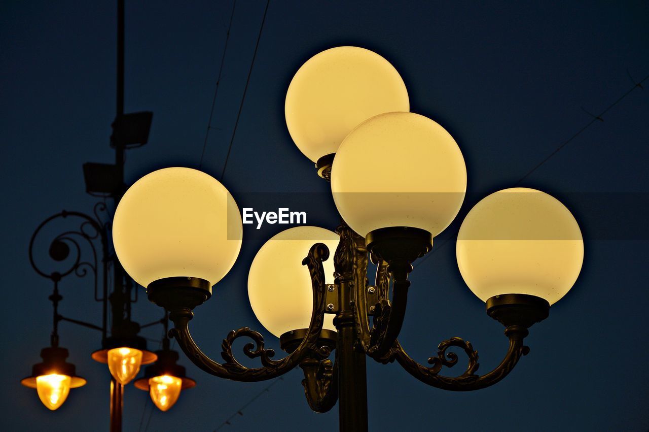 Low angle view of illuminated street light