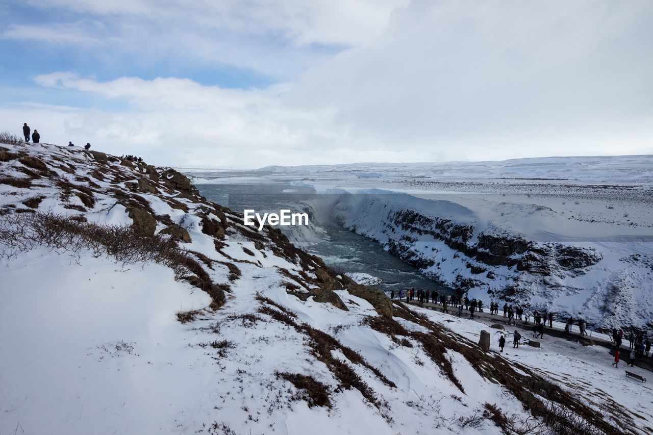 SCENIC VIEW OF SNOW COVERED MOUNTAINS