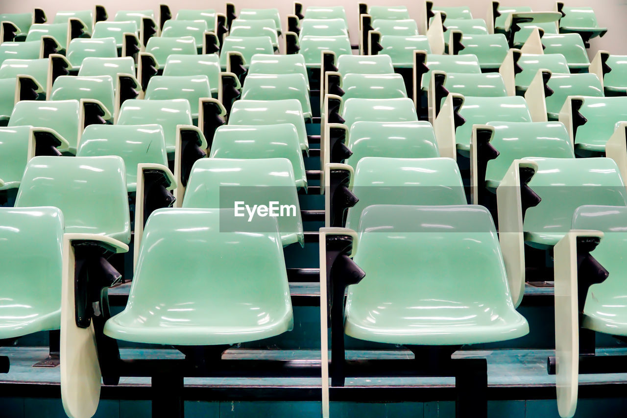 Full frame shot of empty seats in stadium