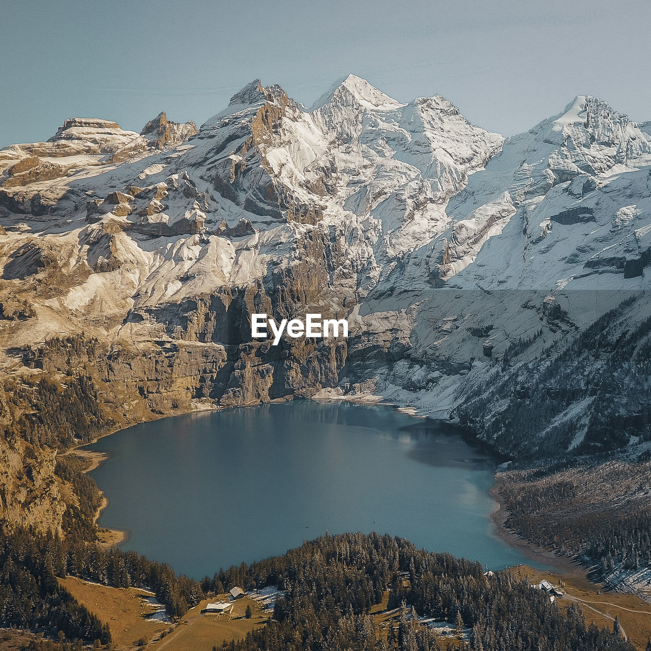 Scenic view of snowcapped mountains and lake against sky