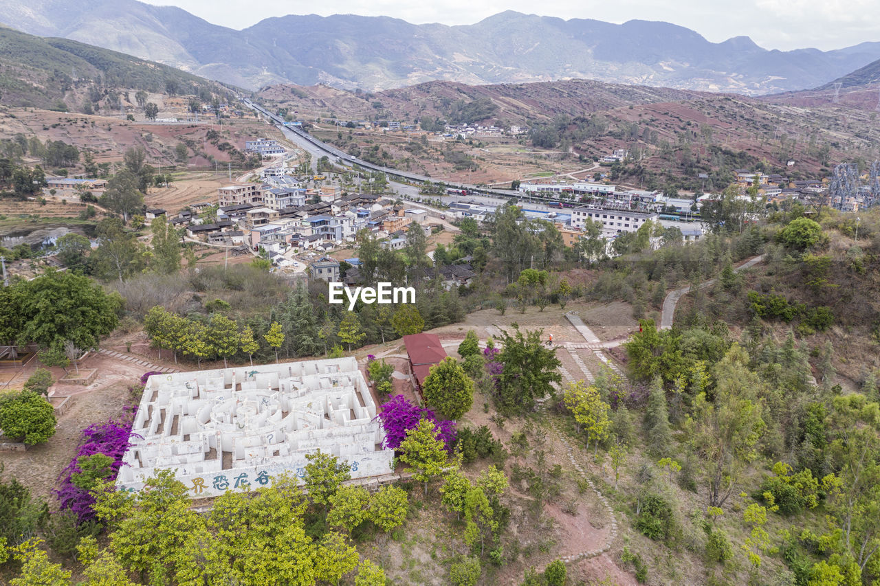 Aerial view of dianchi lake and kunming with abandoned airplane on foreground