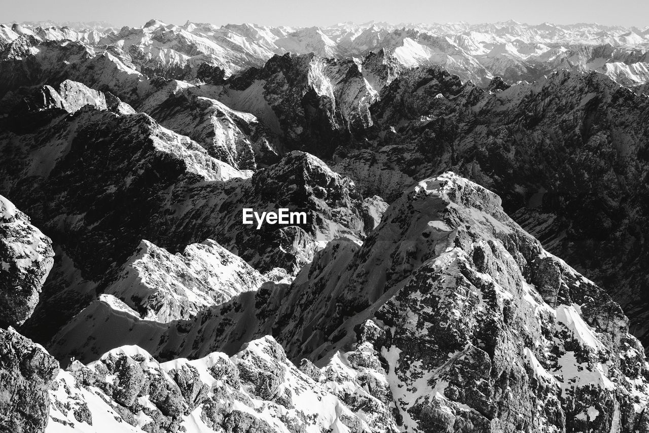 High angle view of rock formation against sky