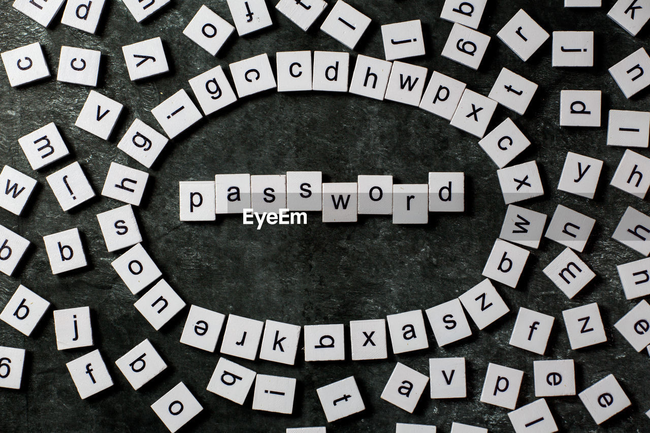 High angle view of toy blocks with text on table