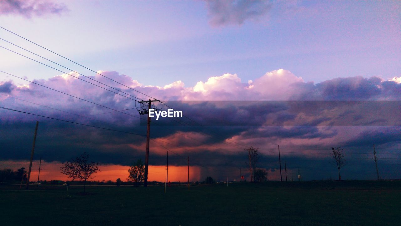 Scenic view of landscape against cloudy sky