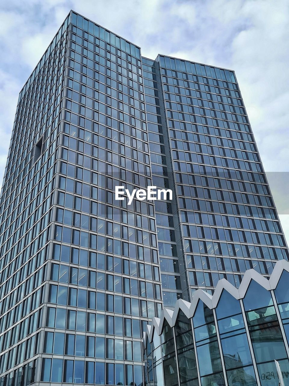 Low angle view of modern building against sky