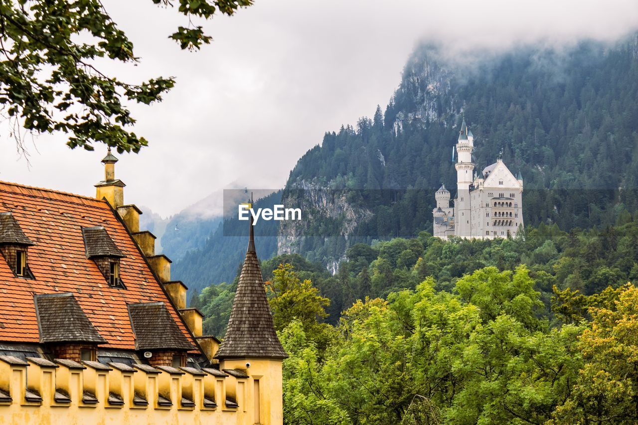 PANORAMIC VIEW OF BUILDINGS AGAINST SKY