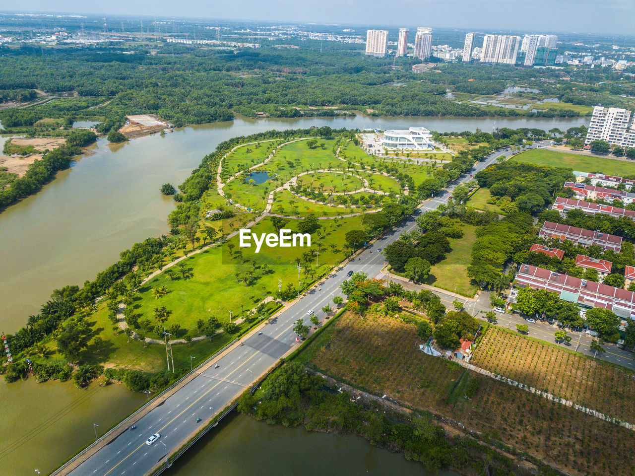 HIGH ANGLE VIEW OF RIVER BY CITY